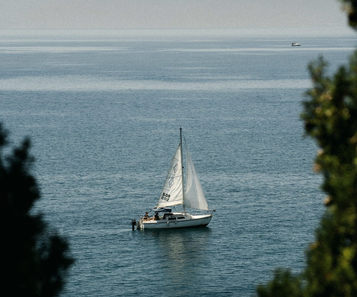 Sailboat on calm water, USDT flash TRC20